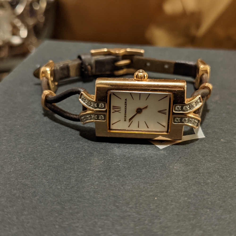 BCBG Maxazria gold plated diamond watch